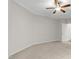 A large bedroom with a ceiling fan, neutral carpet and walls at 118 Manning Way, Durham, NC 27703