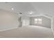 Expansive bonus room offering versatility with neutral walls, carpet and natural light from a window at 118 Manning Way, Durham, NC 27703