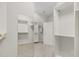 Spacious walk-in closet with a mirror and custom shelving at 118 Manning Way, Durham, NC 27703