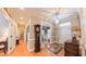 Bright foyer with wood floors, chandelier, and decorative rug welcomes you into this lovely home at 119 Georgetowne Dr, Elon, NC 27244