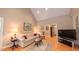 Open living room with hardwood floors and neutral decor at 119 Georgetowne Dr, Elon, NC 27244