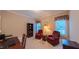 Comfortable office with built-in bookcase, desk, and seating at 119 Georgetowne Dr, Elon, NC 27244