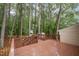 Inviting back deck perfect for outdoor entertaining with views of the wooded backyard at 12 Striding Ridge Ct, Durham, NC 27713