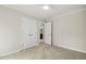 This bedroom features neutral walls, neutral carpeting, and an en-suite bath at 120 Jo Anne Cir, Cary, NC 27513