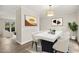 Dining room with contemporary decor, sleek furniture, and stylish lighting at 120 Jo Anne Cir, Cary, NC 27513