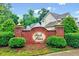 Inviting brick signage welcomes you to Park Place, surrounded by lush greenery and landscaping at 1216 Miracle Dr, Wake Forest, NC 27587