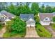 Traditional-style home featuring a two-car garage and a well-manicured front lawn at 1216 Miracle Dr, Wake Forest, NC 27587