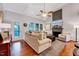 Cozy living room with a fireplace, comfortable seating, and ample natural light at 1216 Miracle Dr, Wake Forest, NC 27587