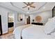 Bedroom includes a view of the en suite bath, beautiful tray ceilings and modern fixtures at 1216 Miracle Dr, Wake Forest, NC 27587