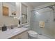 Bathroom with glass shower, modern sink, and toilet at 122 Blackcherry Ln, Chapel Hill, NC 27514