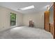 Bedroom with carpet, skylight, and window view at 122 Blackcherry Ln, Chapel Hill, NC 27514