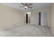Bedroom with closet and ceiling fan at 122 Blackcherry Ln, Chapel Hill, NC 27514