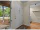 Home entryway featuring a storm door with decorative windows and an interior closet at 122 Blackcherry Ln, Chapel Hill, NC 27514