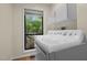 Laundry room with window and machines at 122 Blackcherry Ln, Chapel Hill, NC 27514