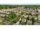 Aerial view of a neighborhood showcasing the well-maintained lawns, mature trees, and diverse home styles at 1310 Silver Dr, Mebane, NC 27302