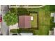 Birds eye view of a home with a fenced backyard and a large tree in the front yard at 1310 Silver Dr, Mebane, NC 27302