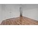 Cozy bedroom with wood-look floors and a closet, providing a comfortable retreat at 1310 Silver Dr, Mebane, NC 27302