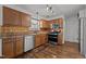 Traditional kitchen features stainless steel appliances, ample cabinetry and laminate countertops at 1310 Silver Dr, Mebane, NC 27302