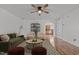 Inviting living room featuring neutral walls, stylish seating, an open archway and hardwood flooring at 1310 Silver Dr, Mebane, NC 27302