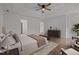 Spacious main bedroom featuring laminate flooring, ensuite bathroom and walk-in closet at 1310 Silver Dr, Mebane, NC 27302