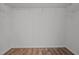 Spacious walk-in closet with wire shelving and wood-look flooring provides ample storage at 1310 Silver Dr, Mebane, NC 27302
