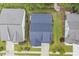 Birds eye view of the roofline, mature landscaping and sidewalks of the neighborhood at 1374 Patriot Points Way, Fuquay Varina, NC 27526