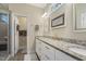 Bathroom features a double vanity with granite countertop and separate shower room at 1374 Patriot Points Way, Fuquay Varina, NC 27526
