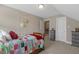 Comfortable bedroom featuring neutral colors and adjacent storage at 1374 Patriot Points Way, Fuquay Varina, NC 27526