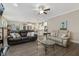 Comfortable living room showcasing hardwood floors, contemporary furniture, and an open floor plan at 1374 Patriot Points Way, Fuquay Varina, NC 27526