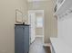 Hallway with mud room, coat hooks and bench at 1374 Patriot Points Way, Fuquay Varina, NC 27526