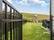 Fenced backyard with grass, play-set and landscaping at 146 Bent Willow Dr, Clayton, NC 27527