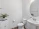 Cozy half bathroom with modern fixtures and a stylish sink at 146 Bent Willow Dr, Clayton, NC 27527