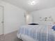 Bedroom features a full bed with patterned bedding and white dresser at 146 Bent Willow Dr, Clayton, NC 27527