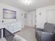 Bright Bedroom features a white dresser, gray rocking chair and decor at 146 Bent Willow Dr, Clayton, NC 27527