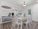 Open dining room featuring wood table and chairs, flowing into the living room at 146 Bent Willow Dr, Clayton, NC 27527