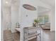 Inviting entryway with a decorative table and access to a brightly lit living space at 146 Bent Willow Dr, Clayton, NC 27527