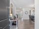 Bright entryway with hardwood floors, open floor plan, and modern decor at 146 Bent Willow Dr, Clayton, NC 27527