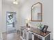 Bright foyer with hardwood floors, a decorative table, and an open doorway at 146 Bent Willow Dr, Clayton, NC 27527