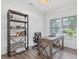 Bright and functional office space with a desk, shelving, and natural light at 146 Bent Willow Dr, Clayton, NC 27527