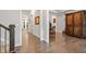 Elegant hallway with gleaming hardwood floors and stylish trim at 1508 Banks Brooke Dr, Raleigh, NC 27603