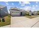 Lovely single-story home with a two-car garage, complemented by a lush lawn and landscaped garden at 1533 Santa Lucia St, Wake Forest, NC 27587