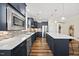 Beautiful kitchen with modern appliances, white countertops, and ample counter space at 1533 Santa Lucia St, Wake Forest, NC 27587