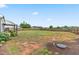 Extensive backyard, enclosed by a wooden fence, provides ample space for outdoor activities at 173 Longbow Dr, Middlesex, NC 27557