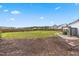 Expansive backyard featuring a wooden fence and plenty of green space, ideal for outdoor activities and relaxation at 173 Longbow Dr, Middlesex, NC 27557