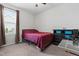 Comfortable bedroom with a plush bed, window, and dresser, creating a relaxing ambiance at 173 Longbow Dr, Middlesex, NC 27557