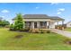 Charming single-story home with a well-manicured lawn, covered porch, and convenient carport at 173 Longbow Dr, Middlesex, NC 27557
