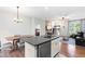 Modern kitchen with stainless steel appliances, ample counter space, and an open view to the living area at 173 Longbow Dr, Middlesex, NC 27557