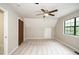 Bedroom with ceiling fan and carpet, offering a comfortable living space at 2012 Stadium Dr, Durham, NC 27705