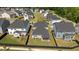 Aerial view of a neighborhood highlighting backyard with a screened-in porch and adjacent homes at 2012 Sweet Samson St, Wake Forest, NC 27587