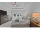 Cozy main bedroom with a ceiling fan, a large window and a chair at 2012 Sweet Samson St, Wake Forest, NC 27587